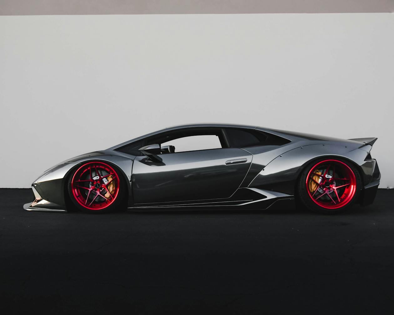 European luxury cars on dealership lot facing Trump 25 percent EU tariff 2026